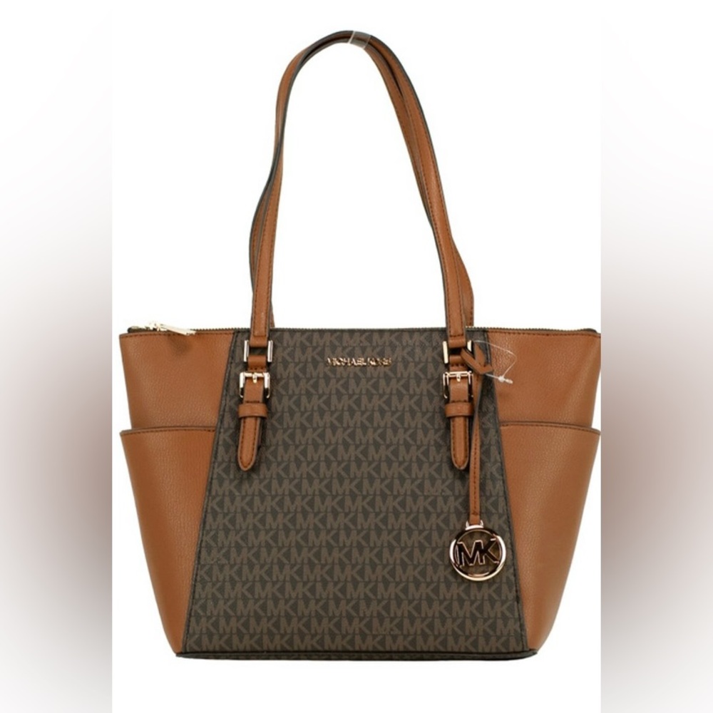 Larger purse with multiple pockets. Michael Kors